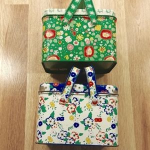 Two  vintage Potpourri brand tins with handles